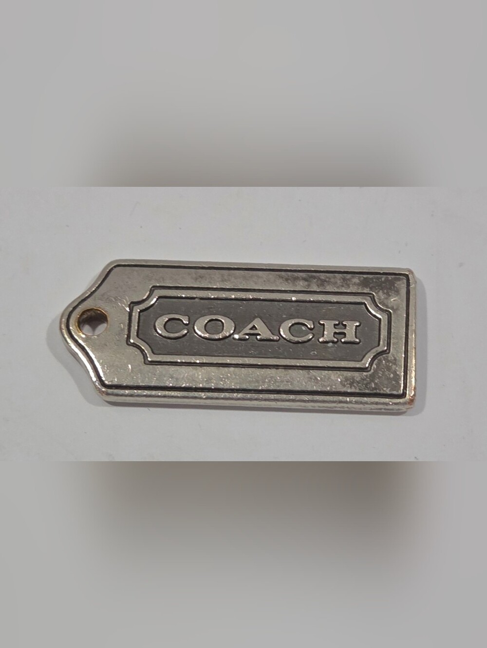 Coach Pre-owned Brushed Silver Nickel Metal Bag Charm Keychain HangTag.
